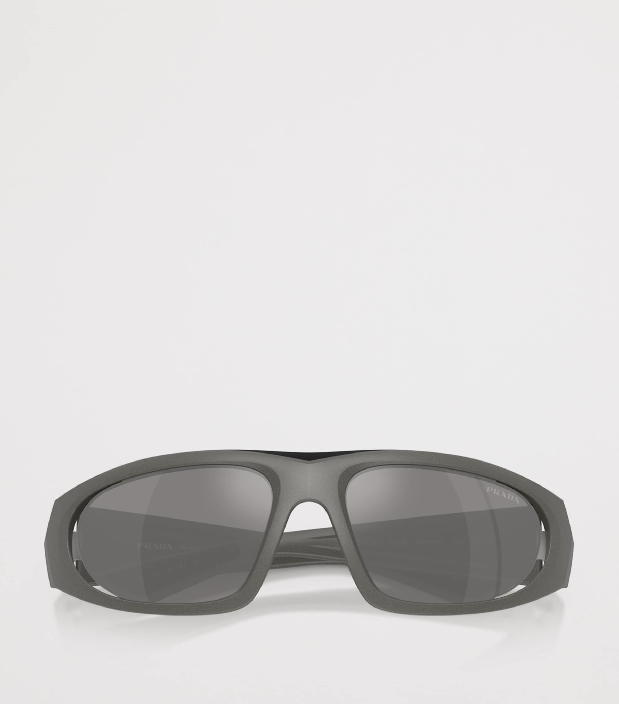 Prada Linea Rossa Irregular Sunglasses In Grey