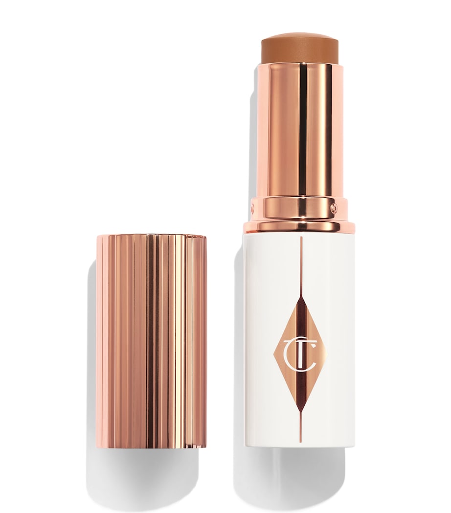 Charlotte Tilbury Unreal Skin Sheer Glow Tint Tan Image 1