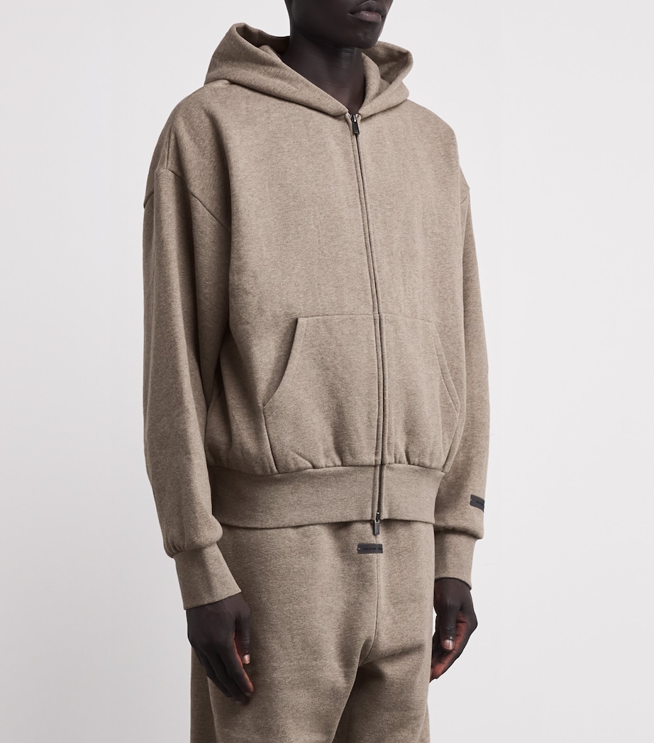 FEAR OF GOD ESSENTIALS Mens Cotton-Blend Logo Zip Hoodie Homestead Heather Image 3
