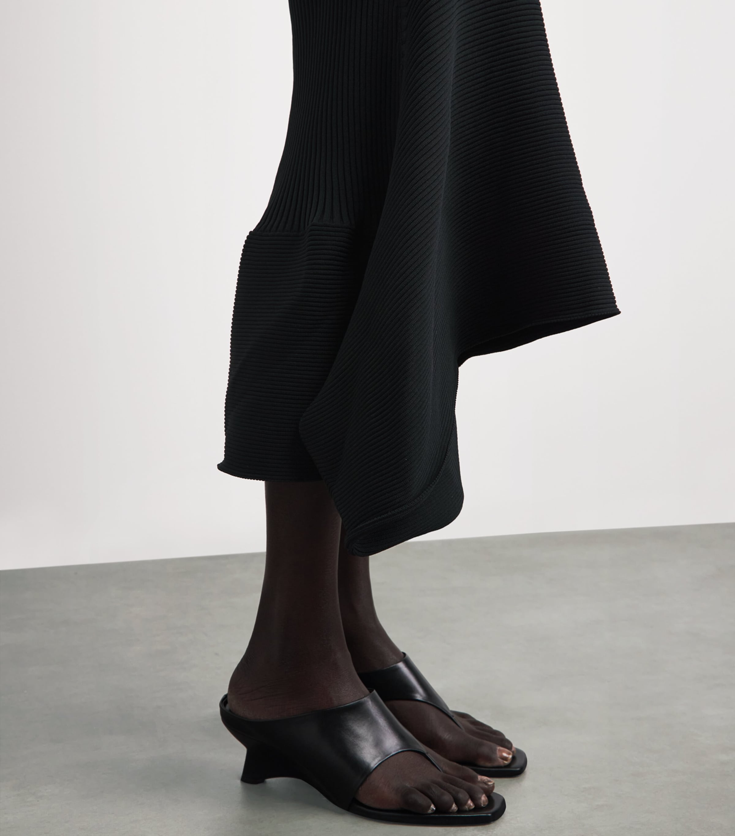 Issey Miyake Black Asymmetric Life Form Midi Skirt | Harrods UK