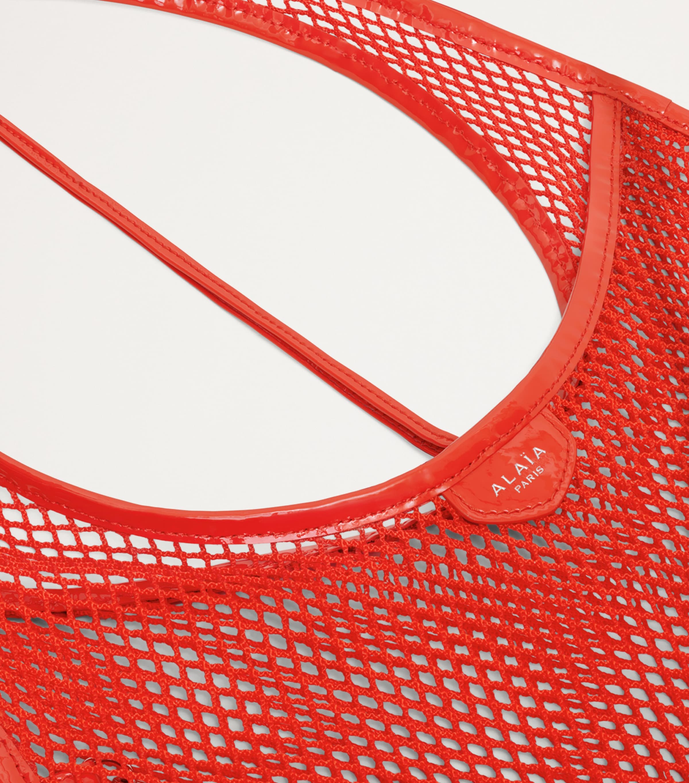 Alaïa Orange Medium One Piece Shoulder Bag | Harrods AU