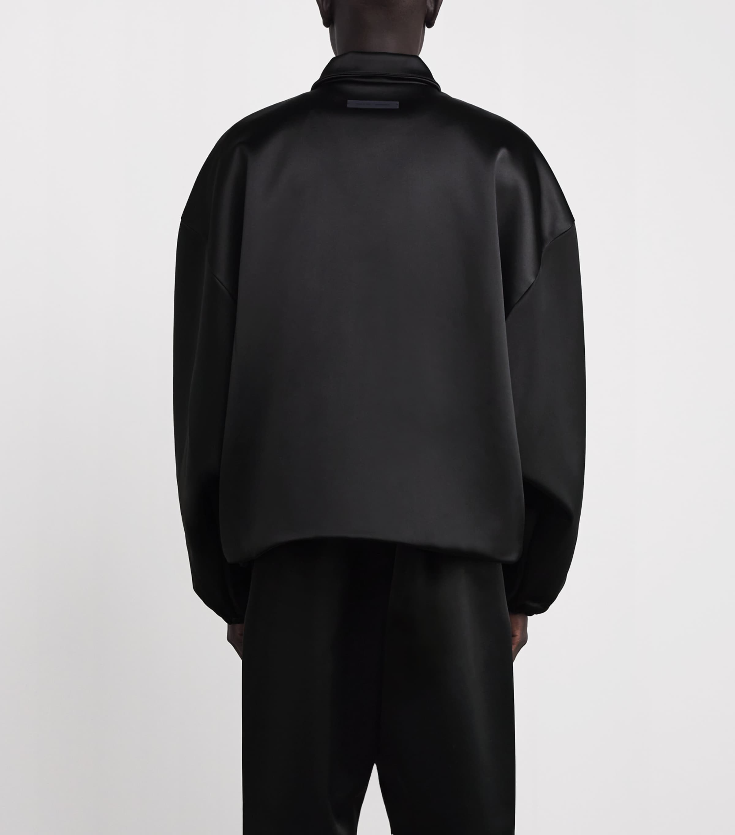 FEAR OF GOD ESSENTIALS Black Bonded Satin Bomber Jacket | Harrods US