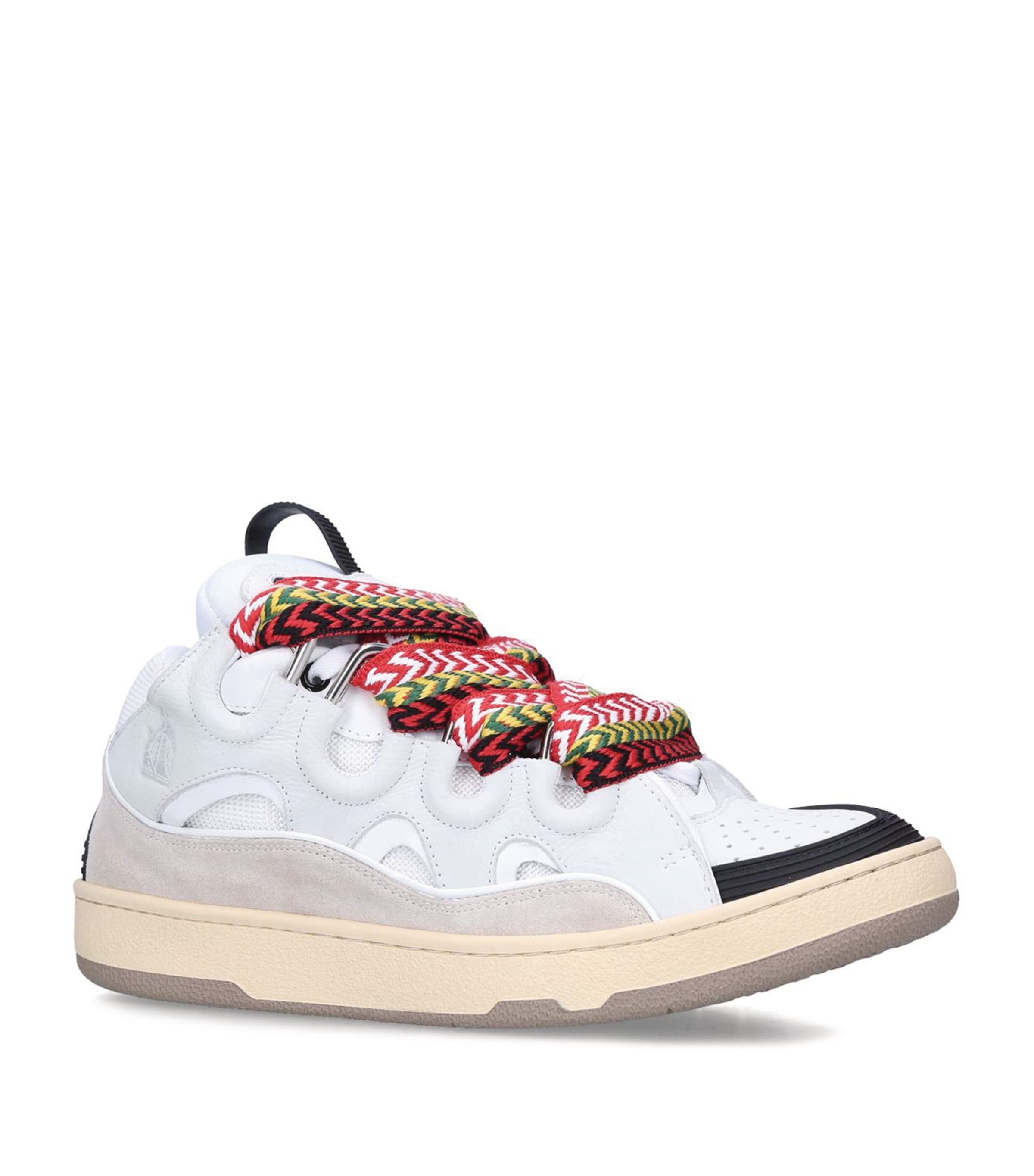 Shop Lanvin Curb Sneakers In White