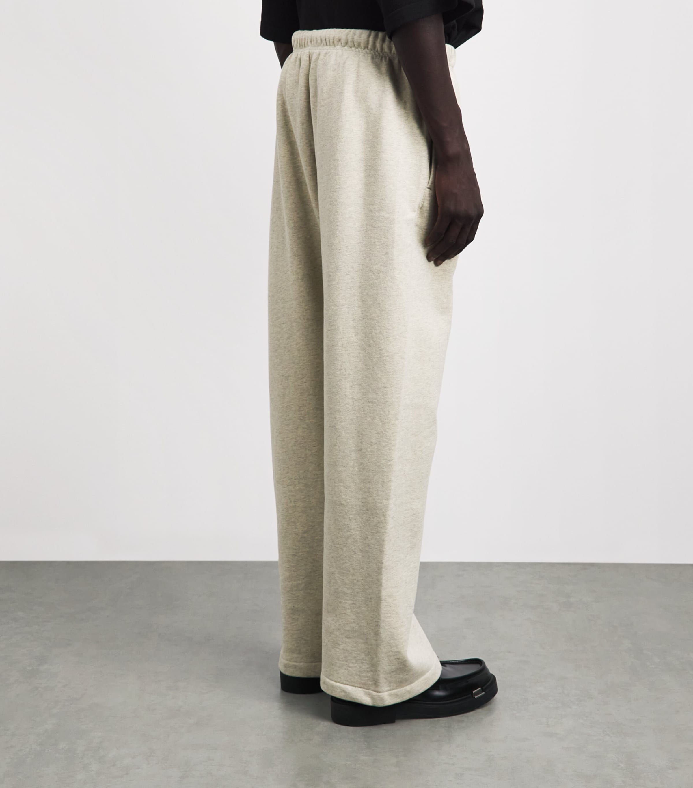 FEAR OF GOD ESSENTIALS Mens Cotton Flared Sweatpants Wshd Vnla Hther Image 5