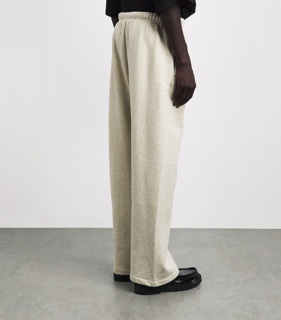 FEAR OF GOD ESSENTIALS Mens Cotton Flared Sweatpants Wshd Vnla Hther Image 5