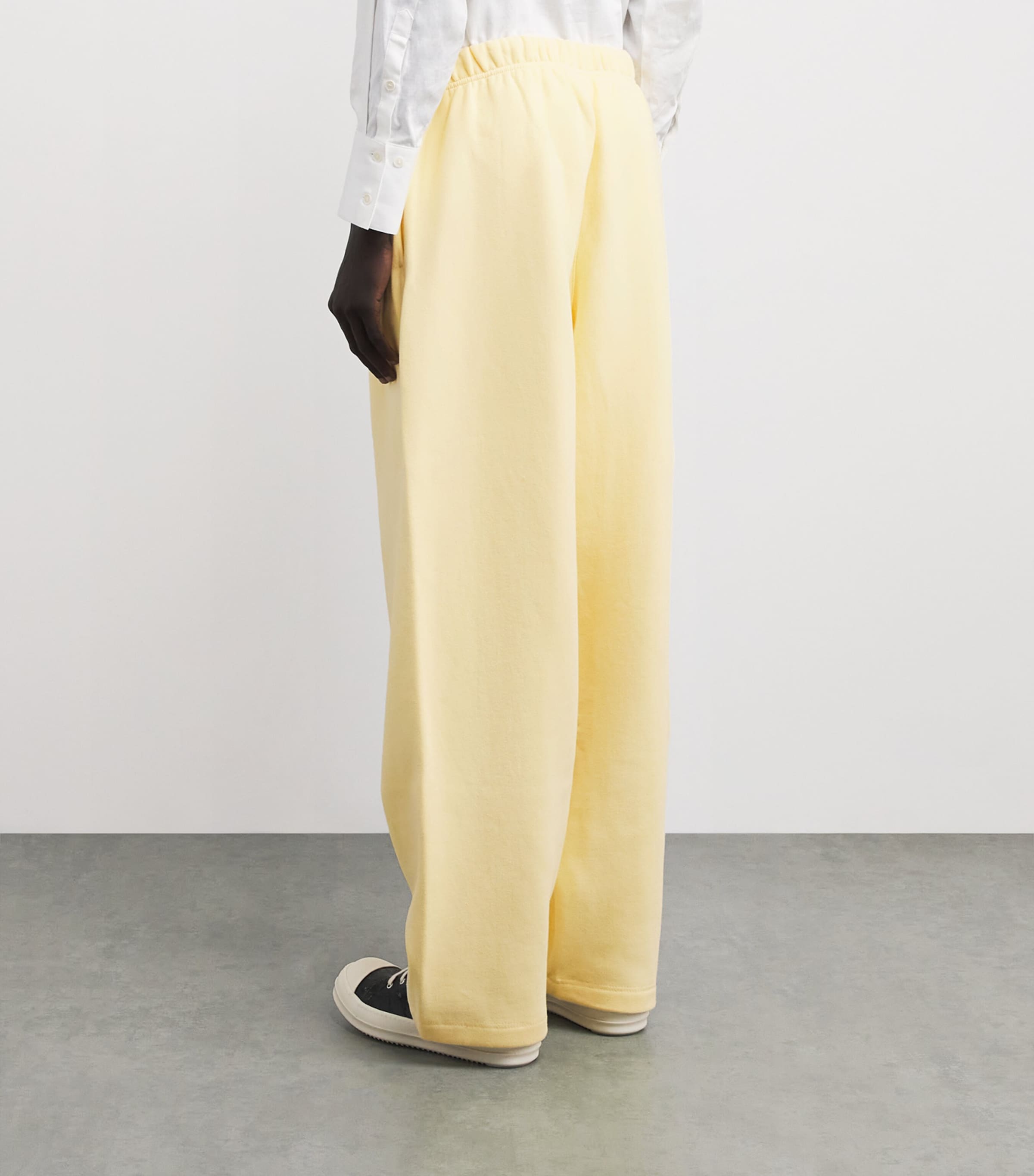 FEAR OF GOD ESSENTIALS Mens Cotton-Blend Wide-Leg Sweatpants Garden Yellow Image 4