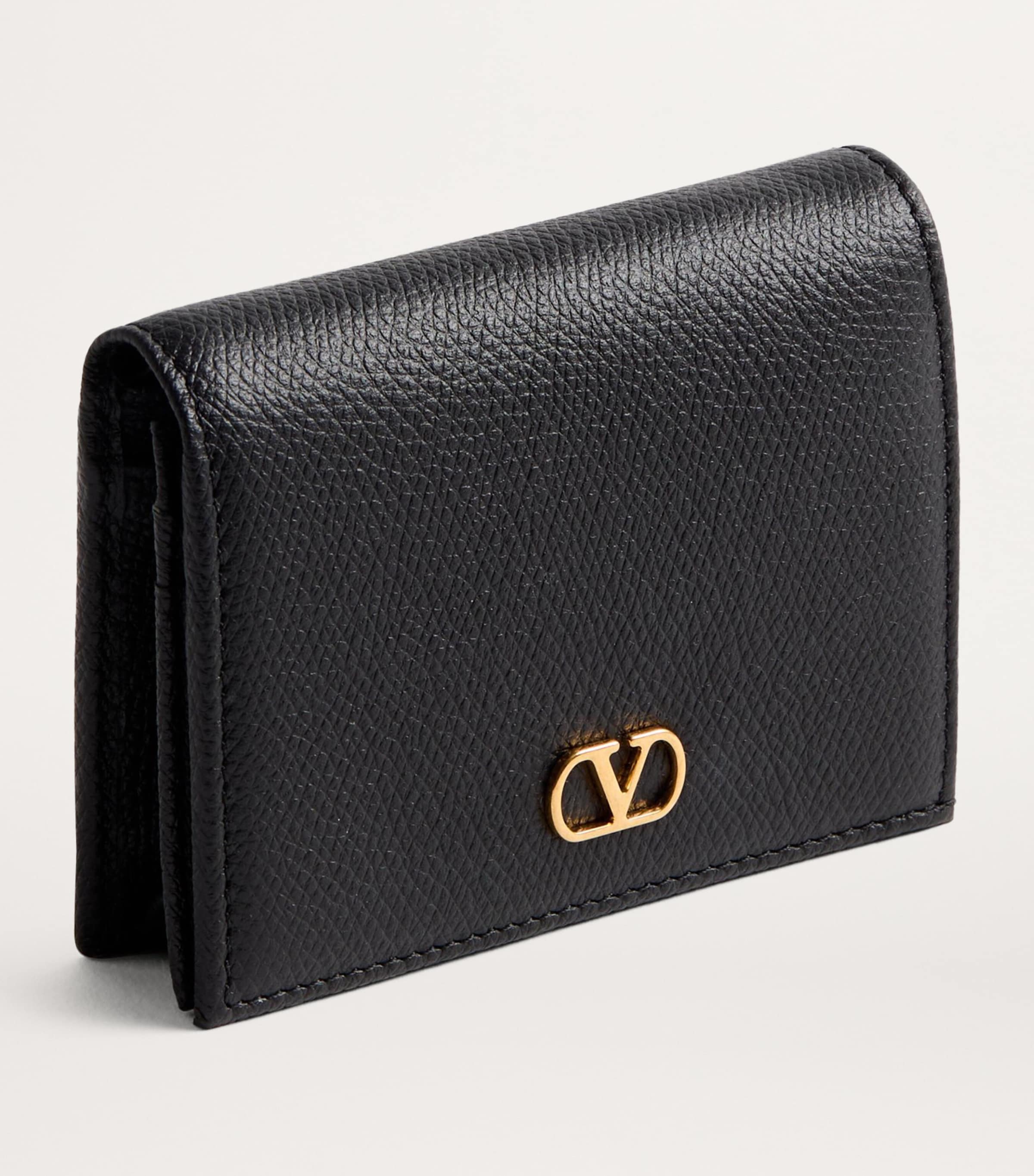 Valentino Garavani Black Leather French Flap Wallet | Harrods UK