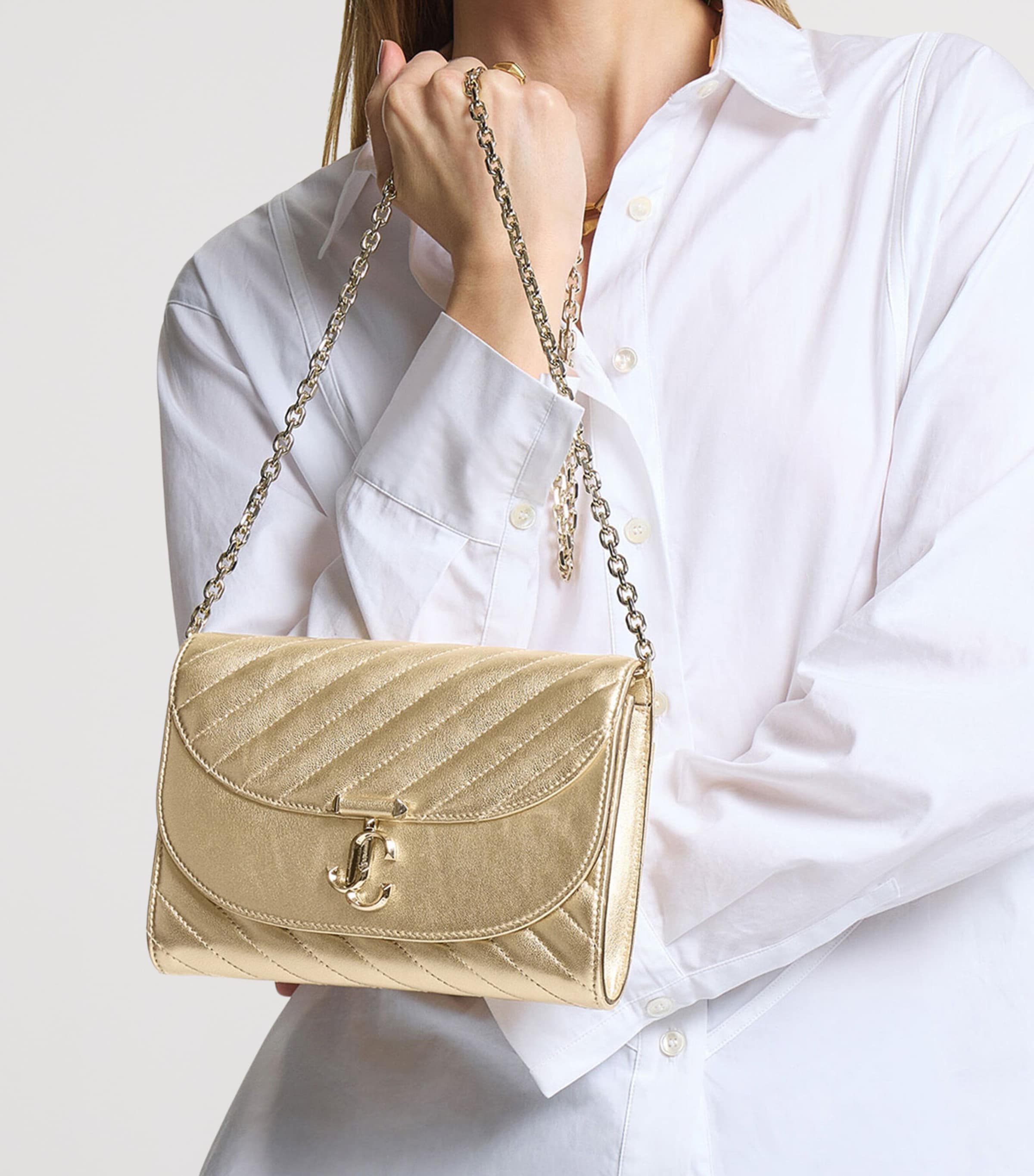 JIMMY CHOO ゴールド パーティーバッグ Jimmy Choo Gold Leather Curve Clutch Bag | Harrods UK