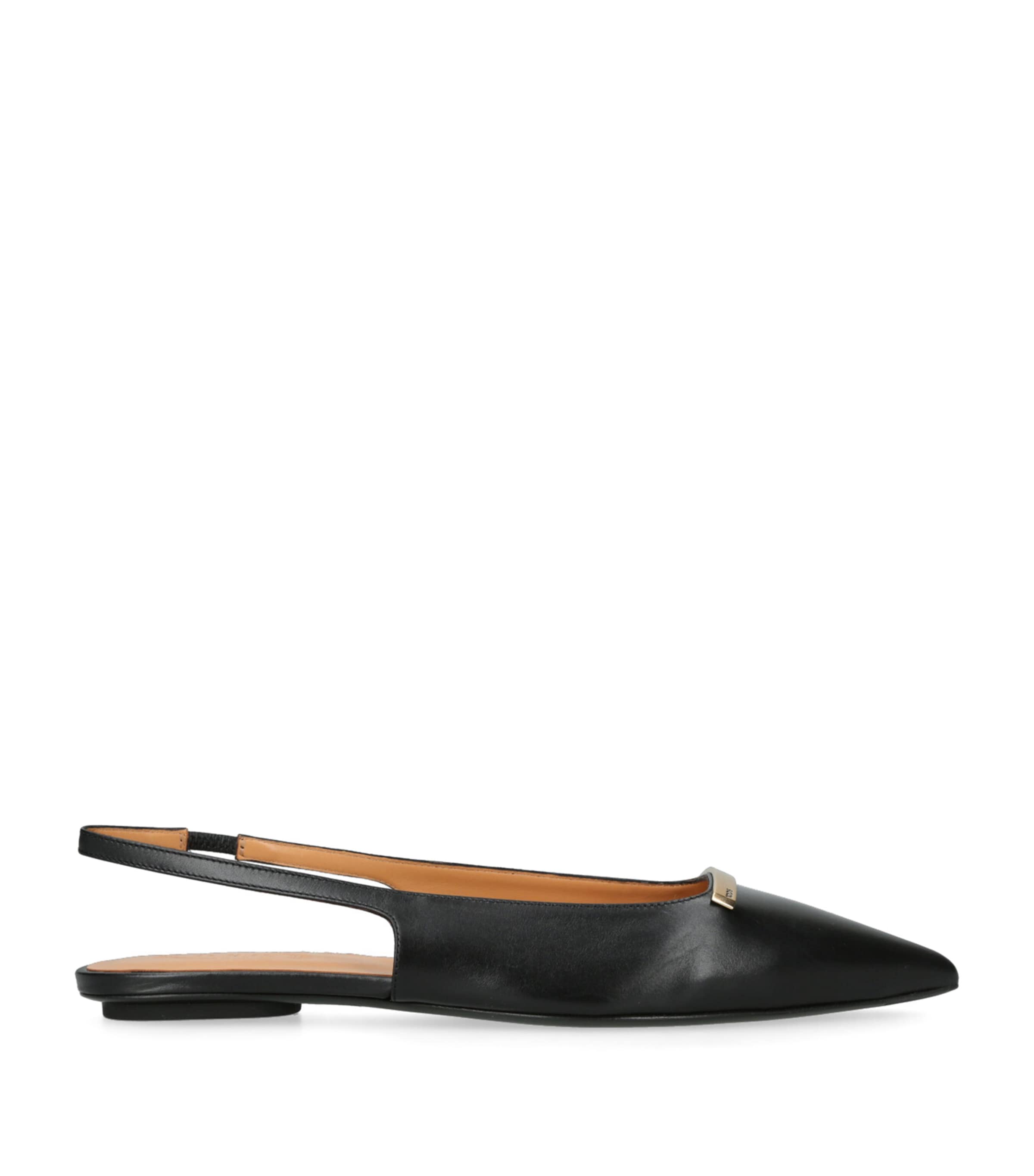 Tod's Leather Flat Ballerinas With Gold-tone Detail In Black