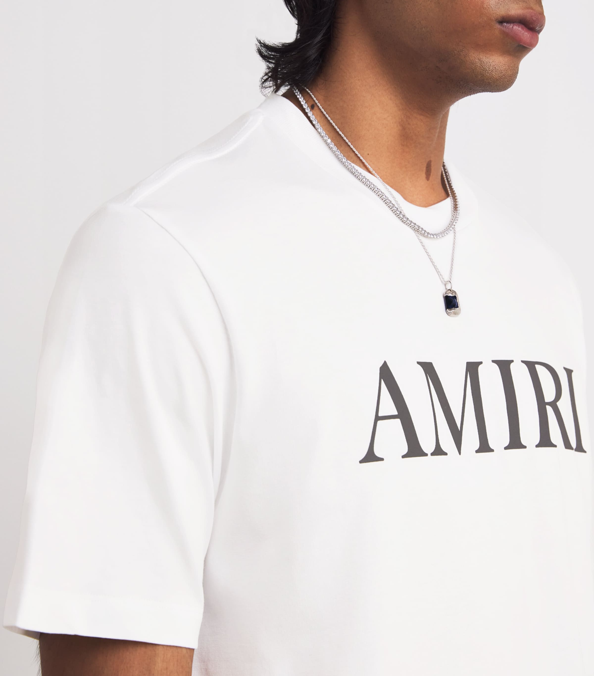 Tシャツ・カットソー AMIRI WHITE COTTON T-SHIRT AMIRI logo-print Cotton T-shirt | White | FARFETCH