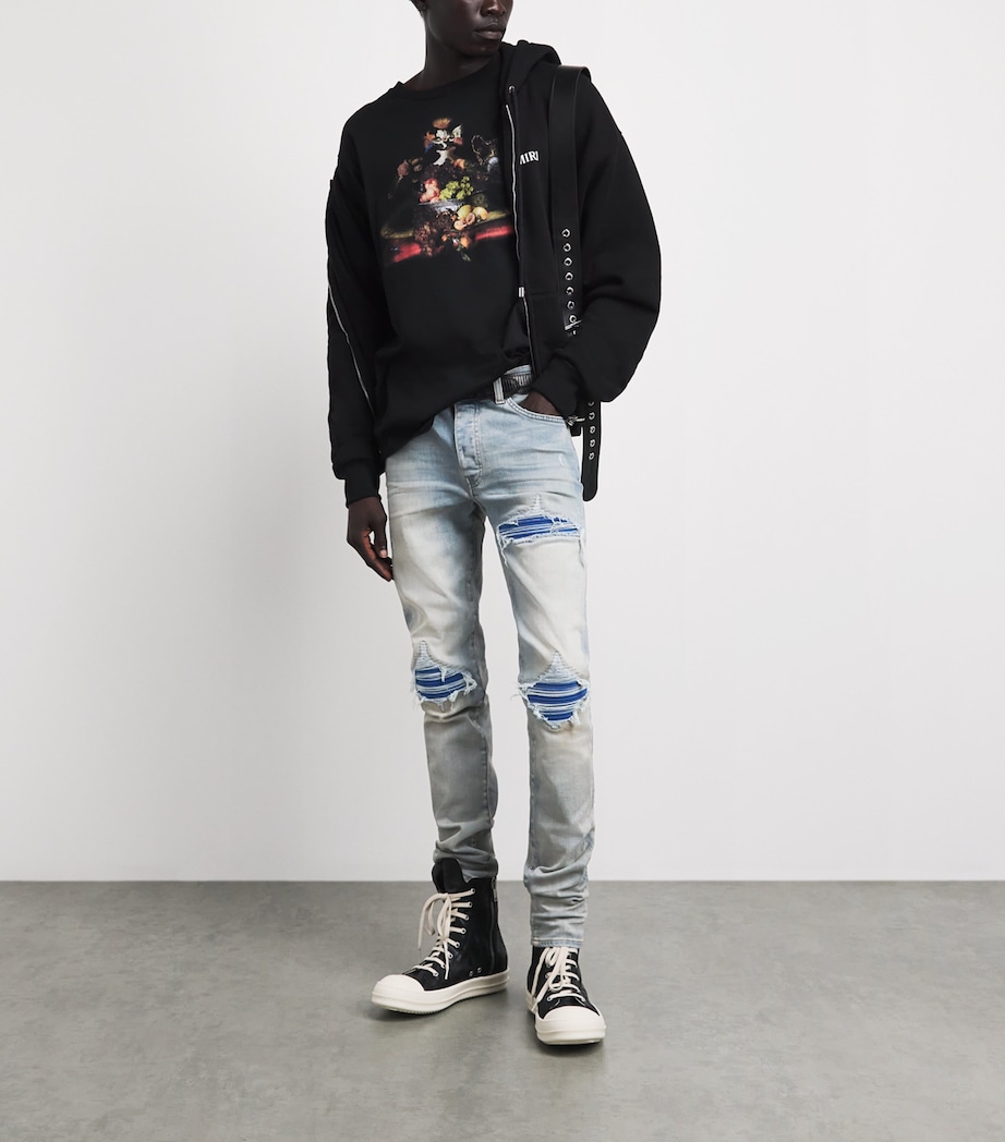 AMIRI Mens Ripped MX1 Ultrasuede Skinny Jeans Antique Indigo Image 2