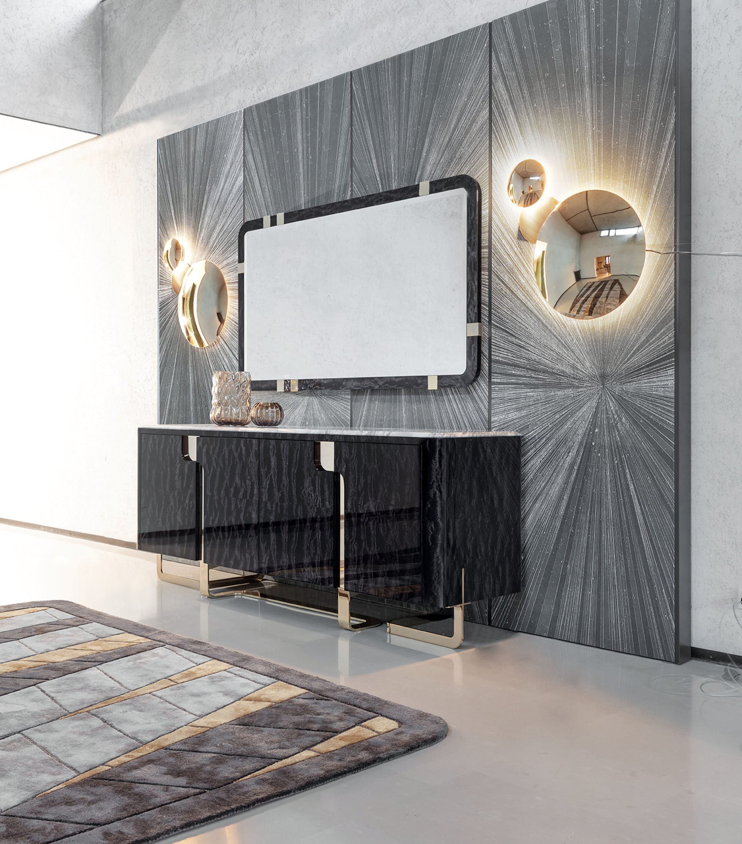 Wall with round mirrors and Charisma Buffet against patterned panels