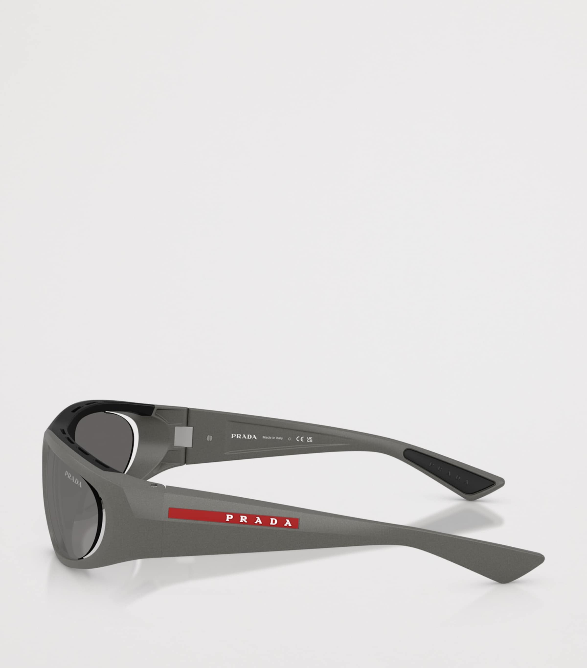 Prada Linea Rossa Irregular Sunglasses In Grey